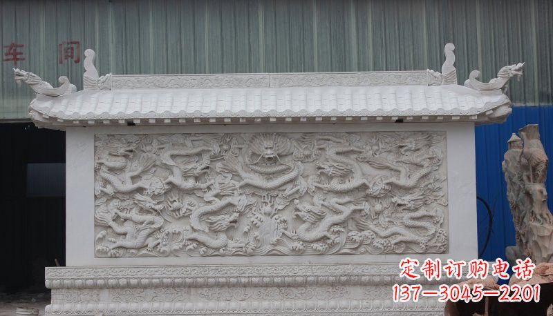 贵州九龙壁石雕塑——让礼堂充满豪华气息