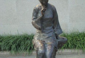 贵州描绘心灵世界的街边低头思考的女孩景观铜雕