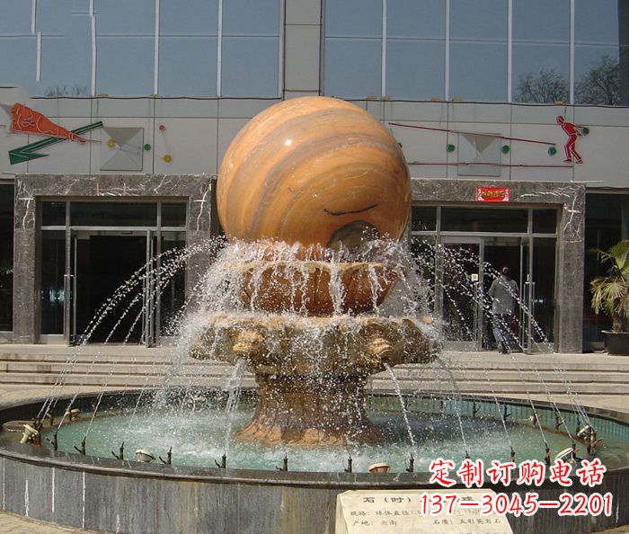 贵州石来运转球晚霞红风水球石雕