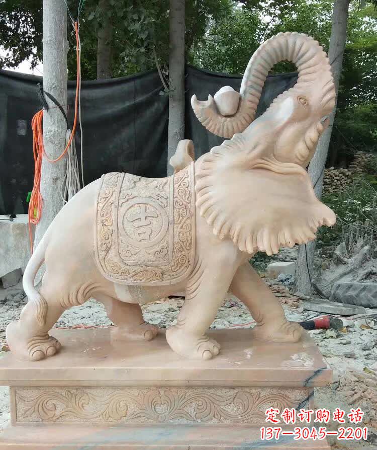 贵州晚霞红卷元宝大象雕塑