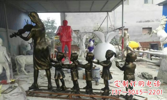 贵州校园老师和儿童铜雕