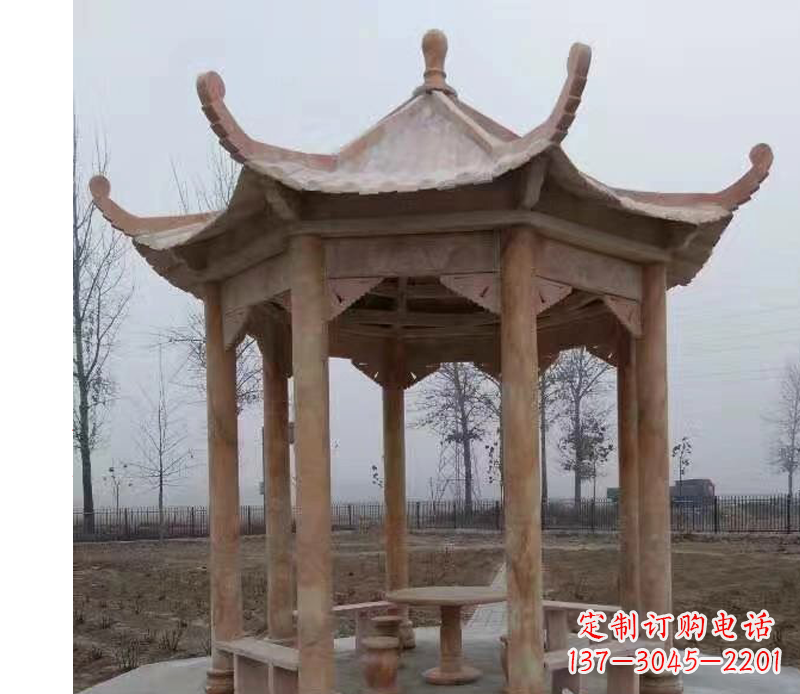 贵州公园晚霞红八角石雕凉亭