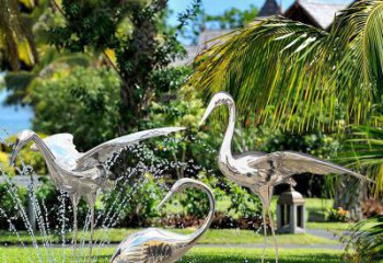 贵州鹤雕塑-公园池塘不锈钢镜面抽象喷泉中的鹤雕塑